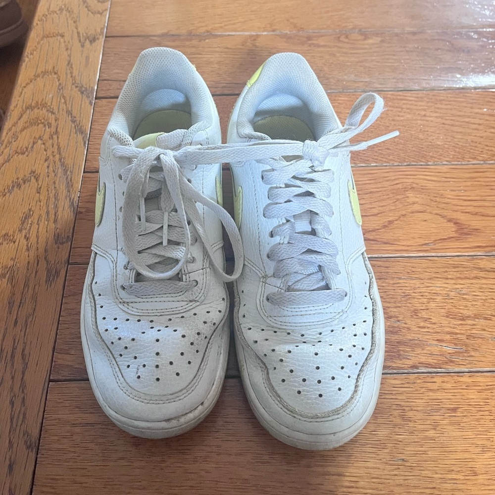 Women’s size 6 Air Force 1s Yellow check mark